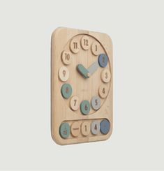 Wooden clock and games for chi Liewood