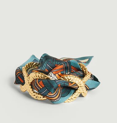 Gold plated cuff bracelet and silk braid