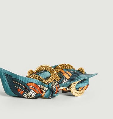 Gold plated cuff bracelet and silk braid