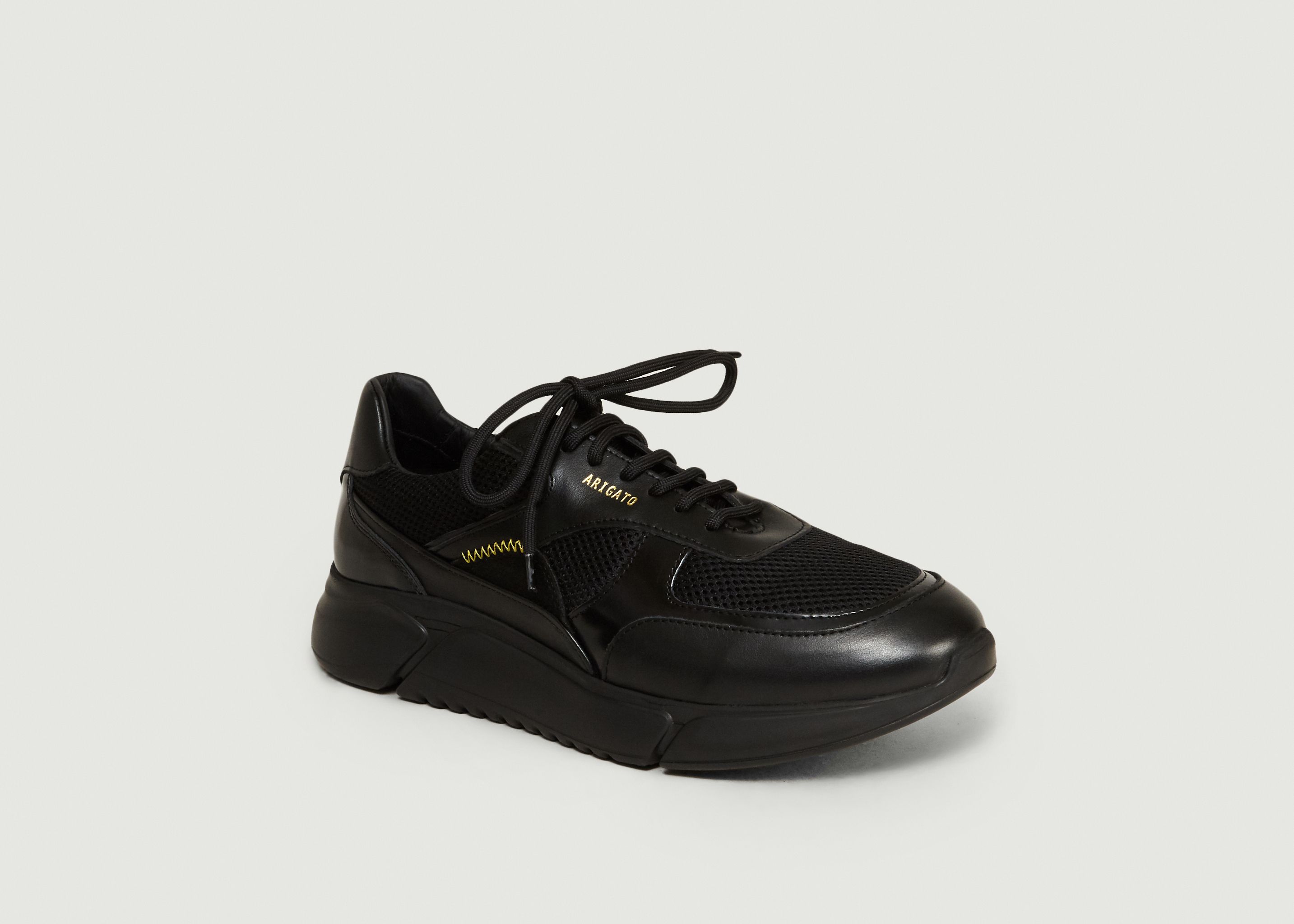 axel arigato genesis black