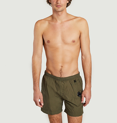 Swim shorts with auxiliary pocket 