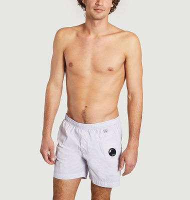 Swim shorts with auxiliary pocket 