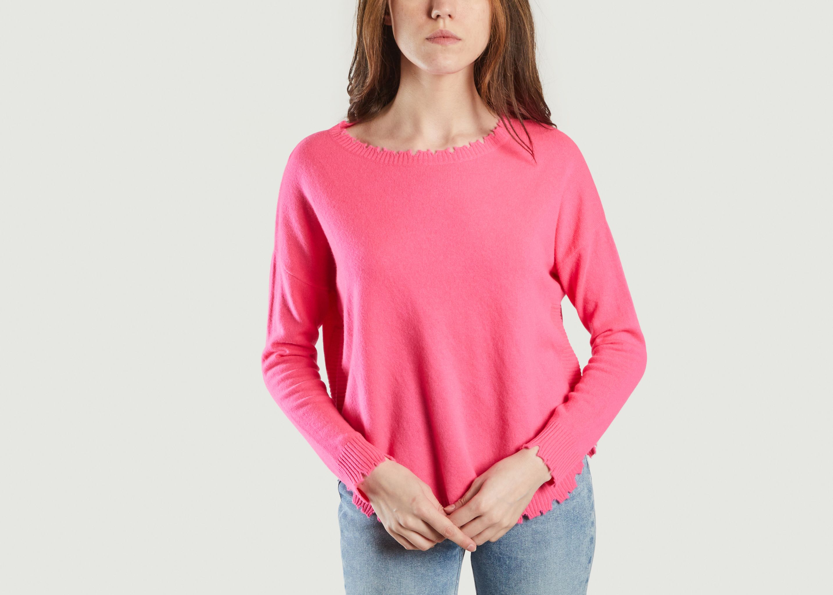 sweater with ripped edges