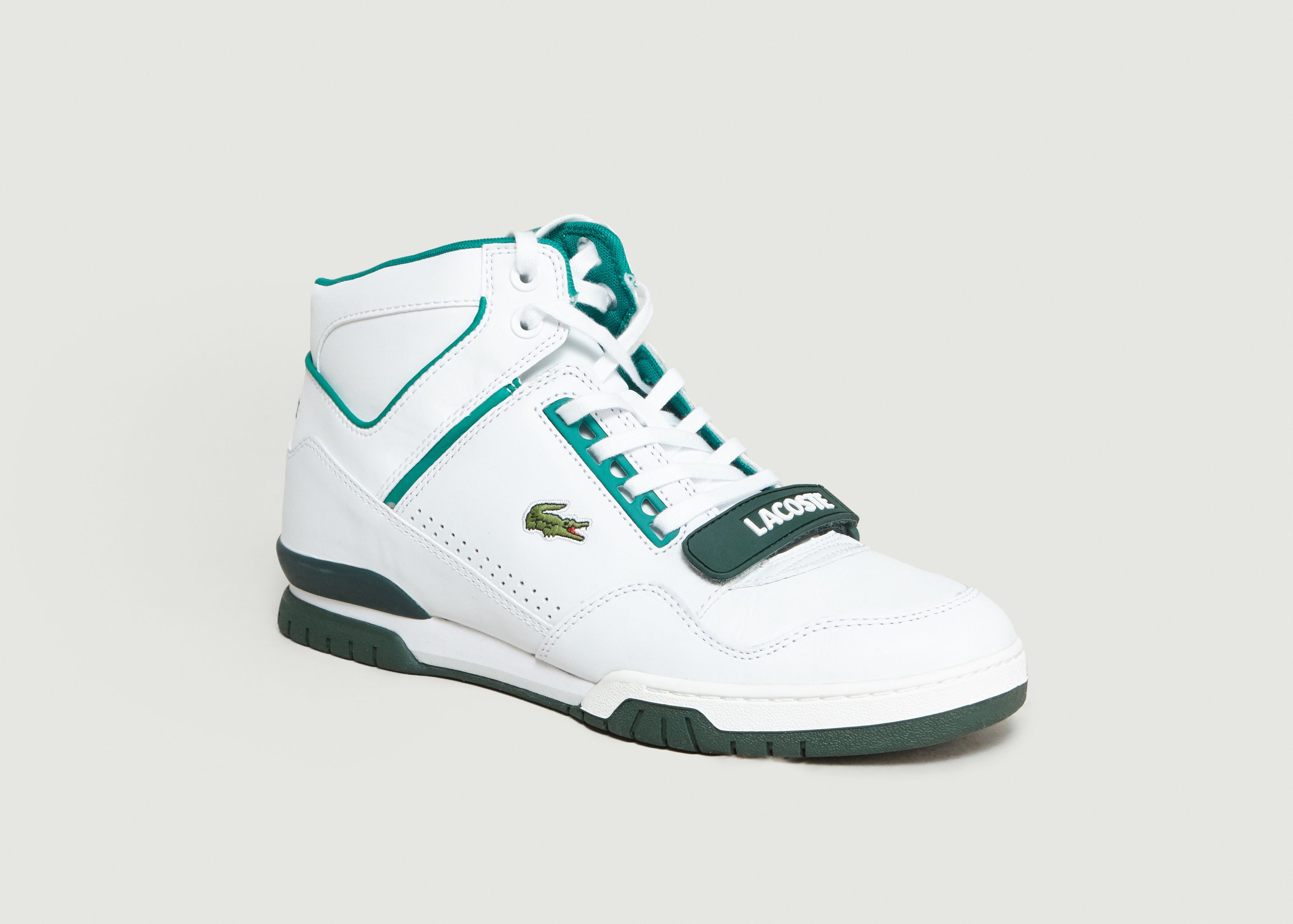 lacoste mid top trainers