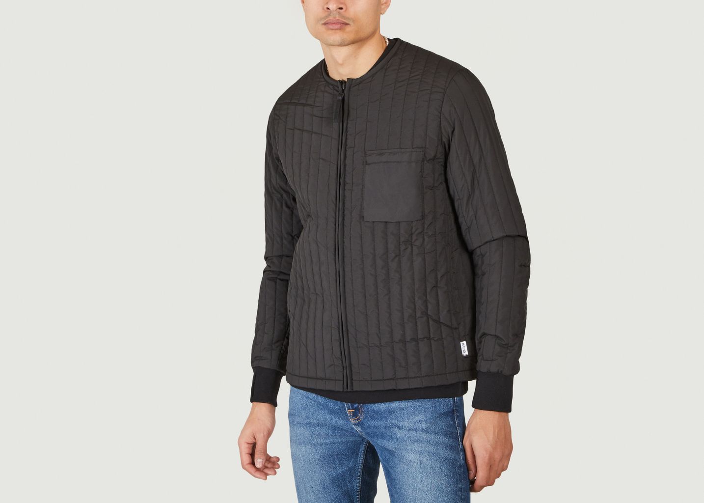 thin black quilted jacket