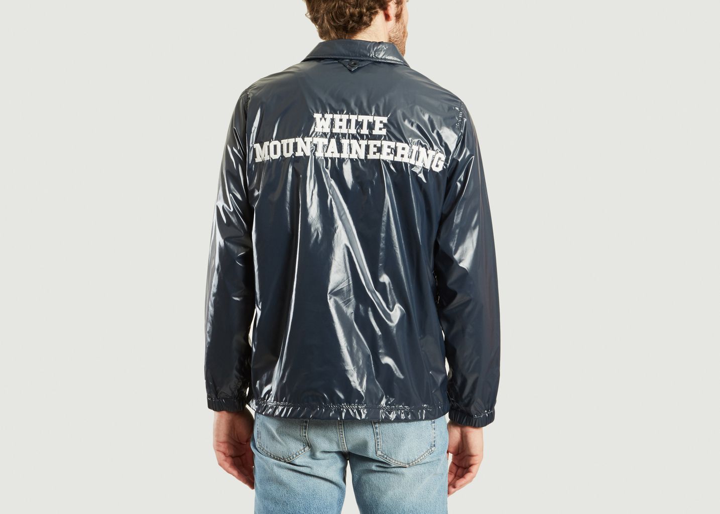 white mountaineering jacket